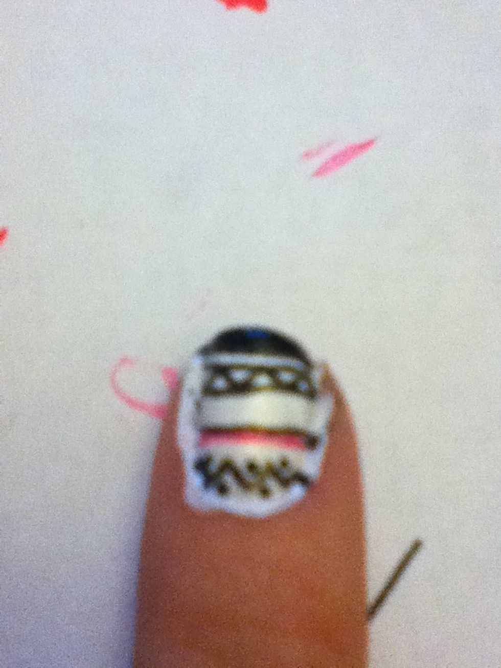 Add some dots and one last line on the top of the nails.