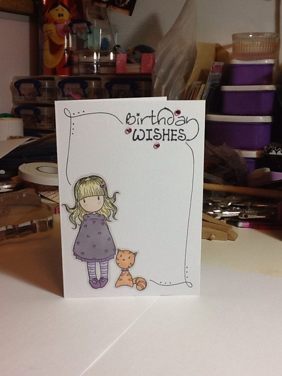 Add some embellishment either using your finer liner or gems. You can also add bows/buttons/card candy, but keep it simple! Stick to the odd number rule (groups of 3s / 5s)