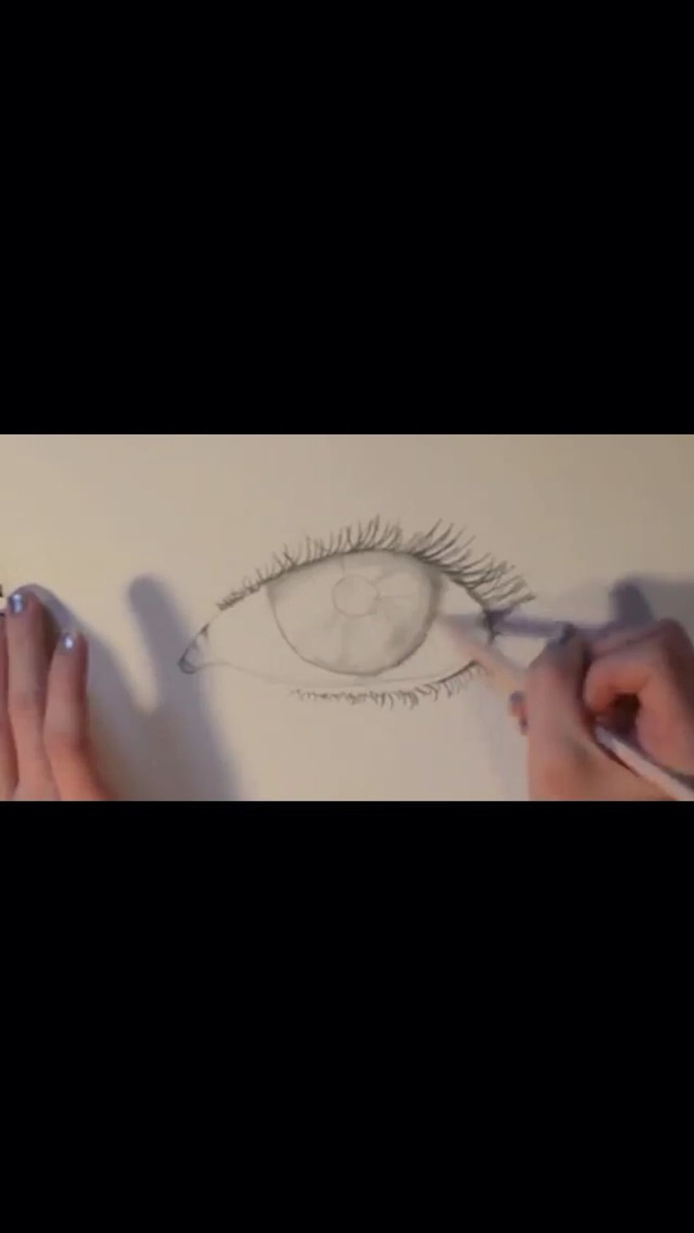 Add some eyelashes. Some prefer to do this in the beginning of the drawing or the end. It's your personal preference!