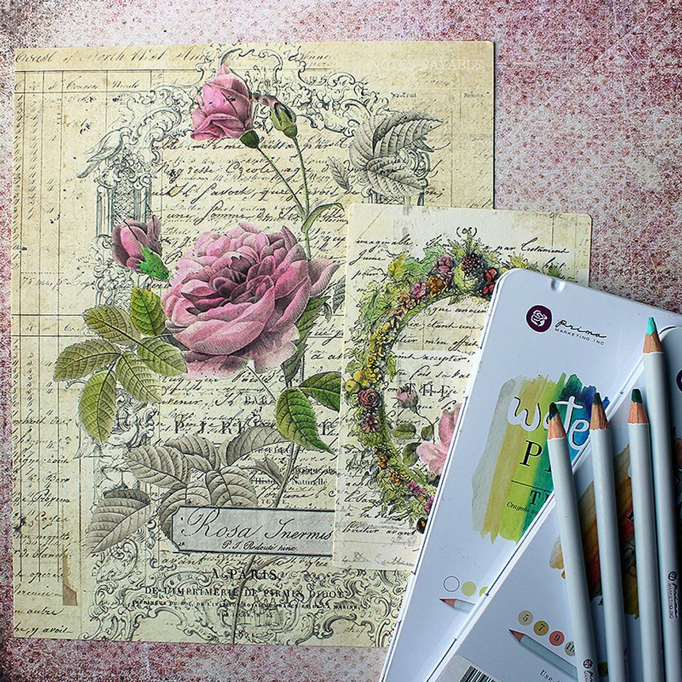 Add some finer details using the watercolor pencils. Add shadowing and details to the flowers and leaves. Let the design guide you and use darker colors to the places that are already colored darker.