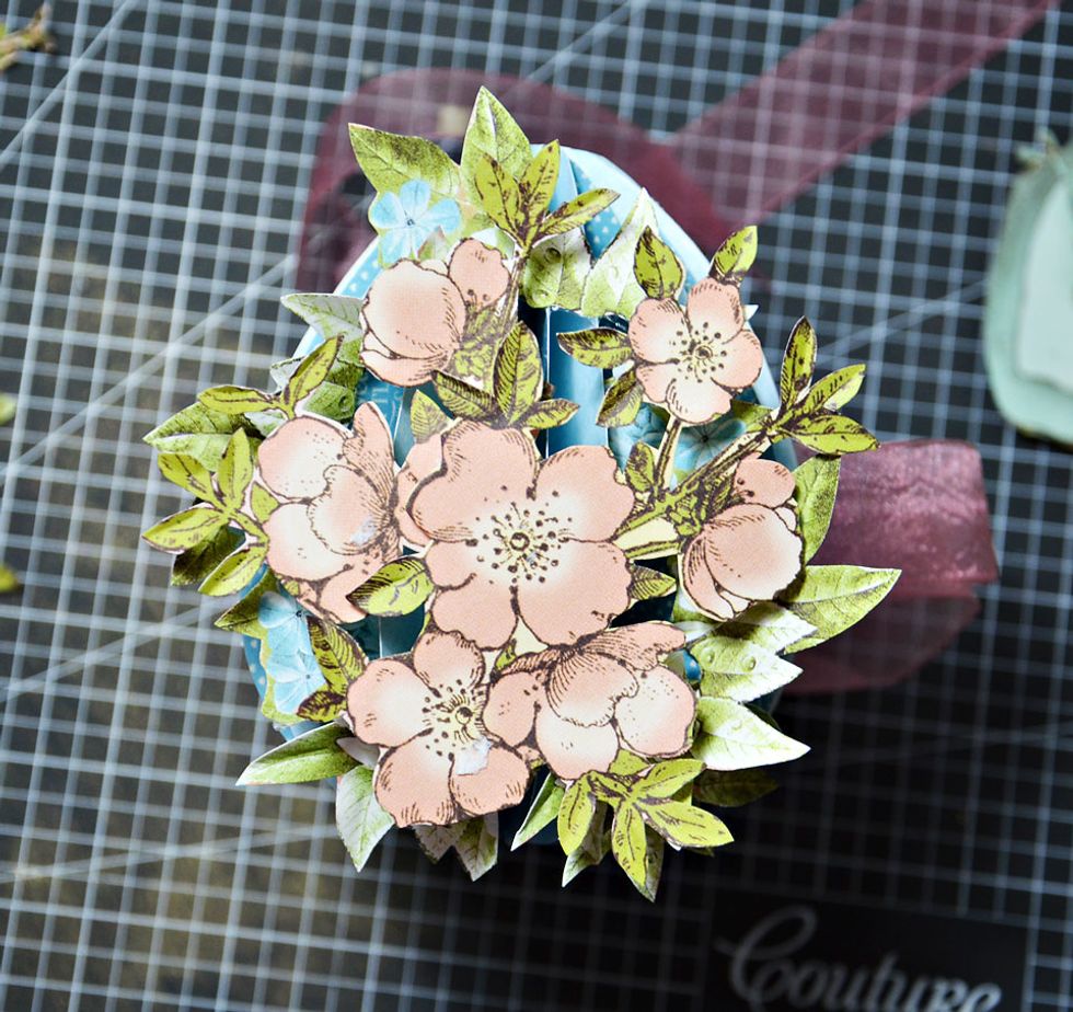 Add some flowers from Graphic 45 Once Upon A Springtime collection papers.