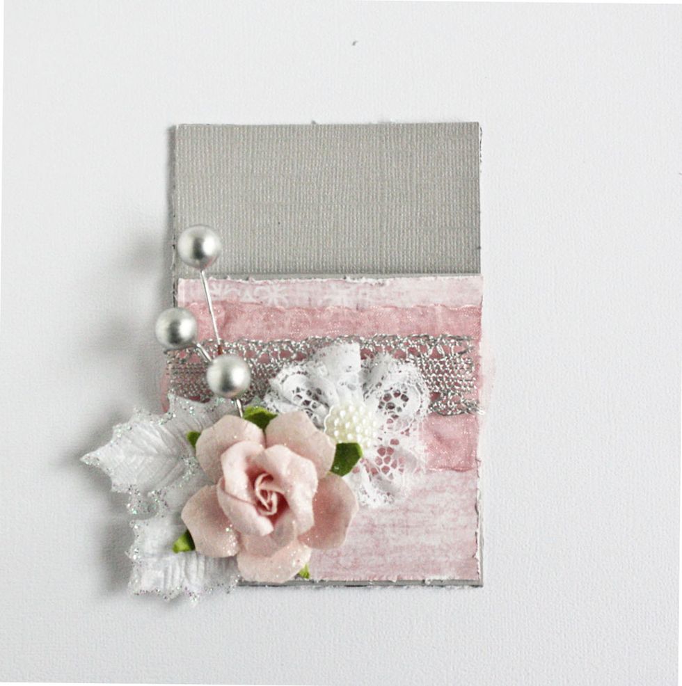 Add some flowers, leaves and spray.