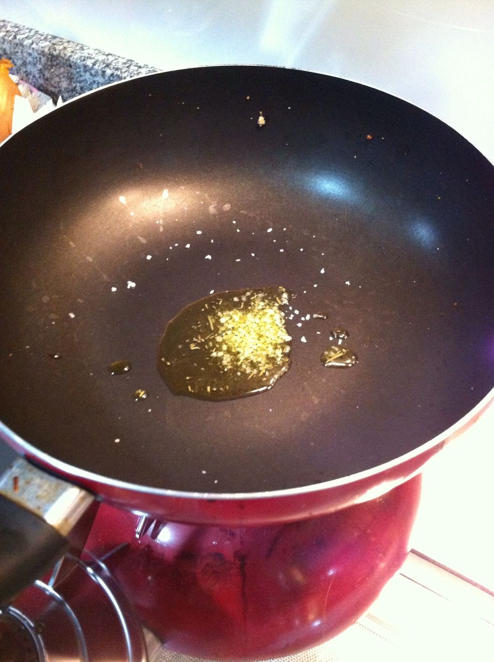 Add some garlic, a pinch of salt and some grinds of pepper and the add the bread