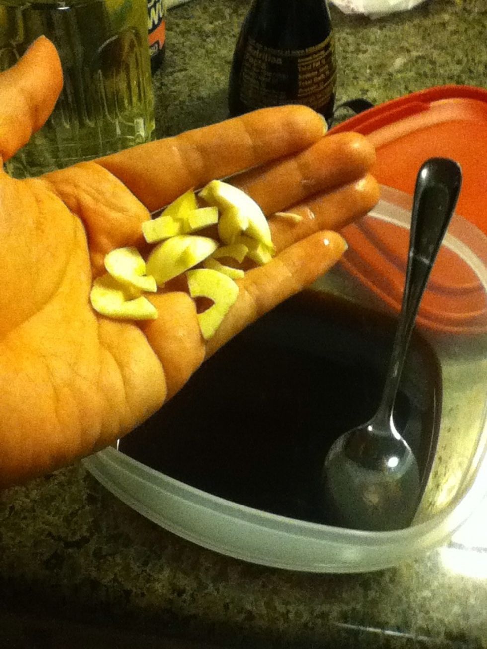 Add some garlic. You can grate them, fine chop or slice, whatever you like. I'm adding one clove of thick slices and chunks.