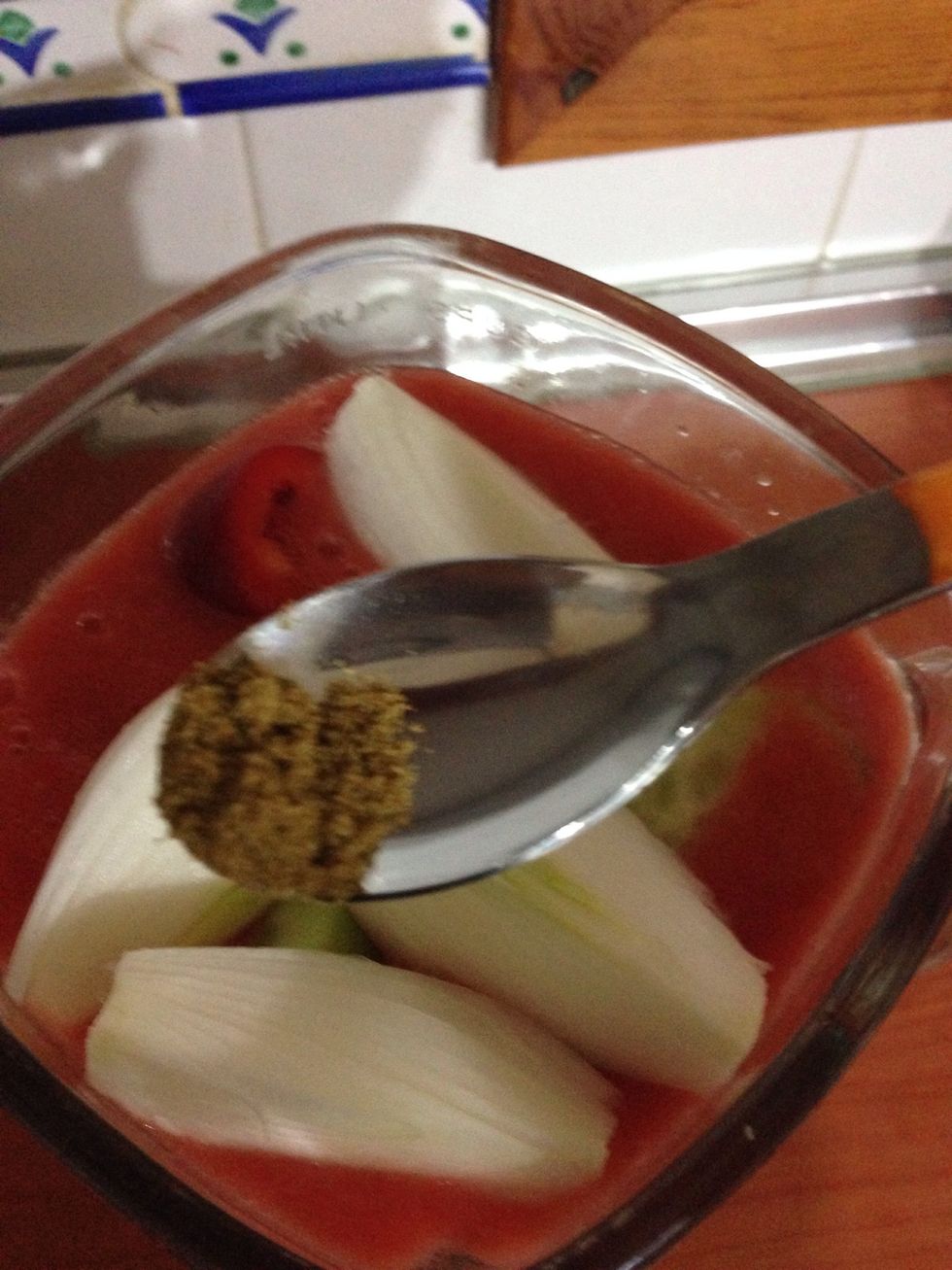 Add some ground cumin ( a\u00f1adir un poco de comino molido )