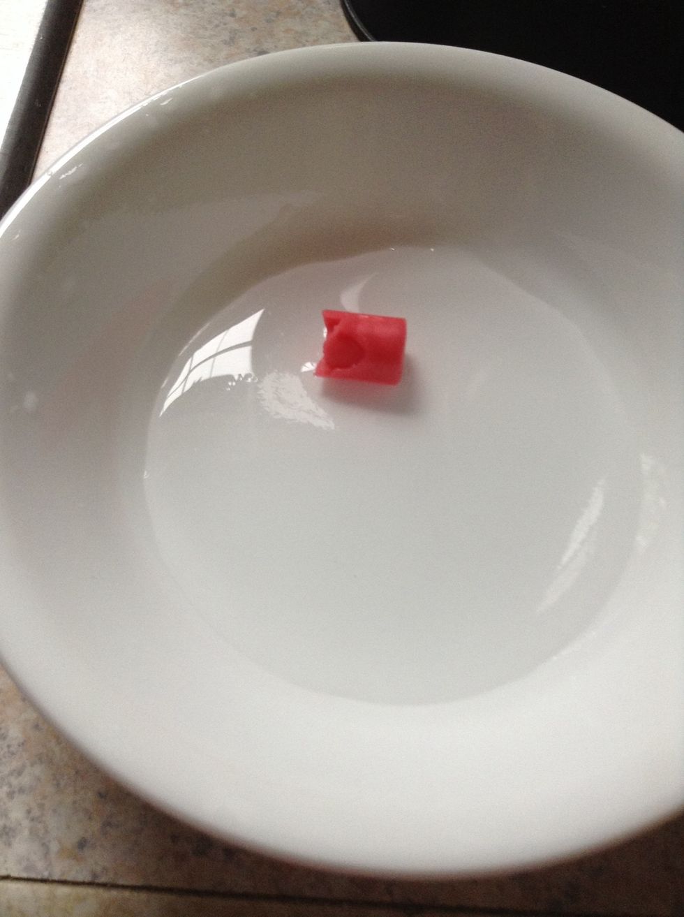 Add some hot hot water into the Chapstick bowl