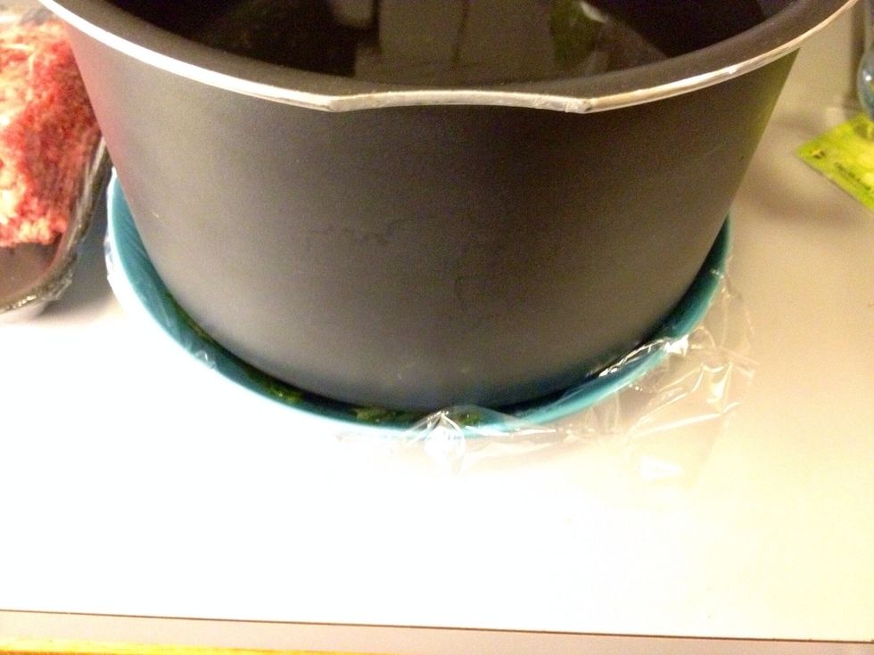 Add some kind of weight; I used a large pot that I filled with water. Press it at least 1 hour.