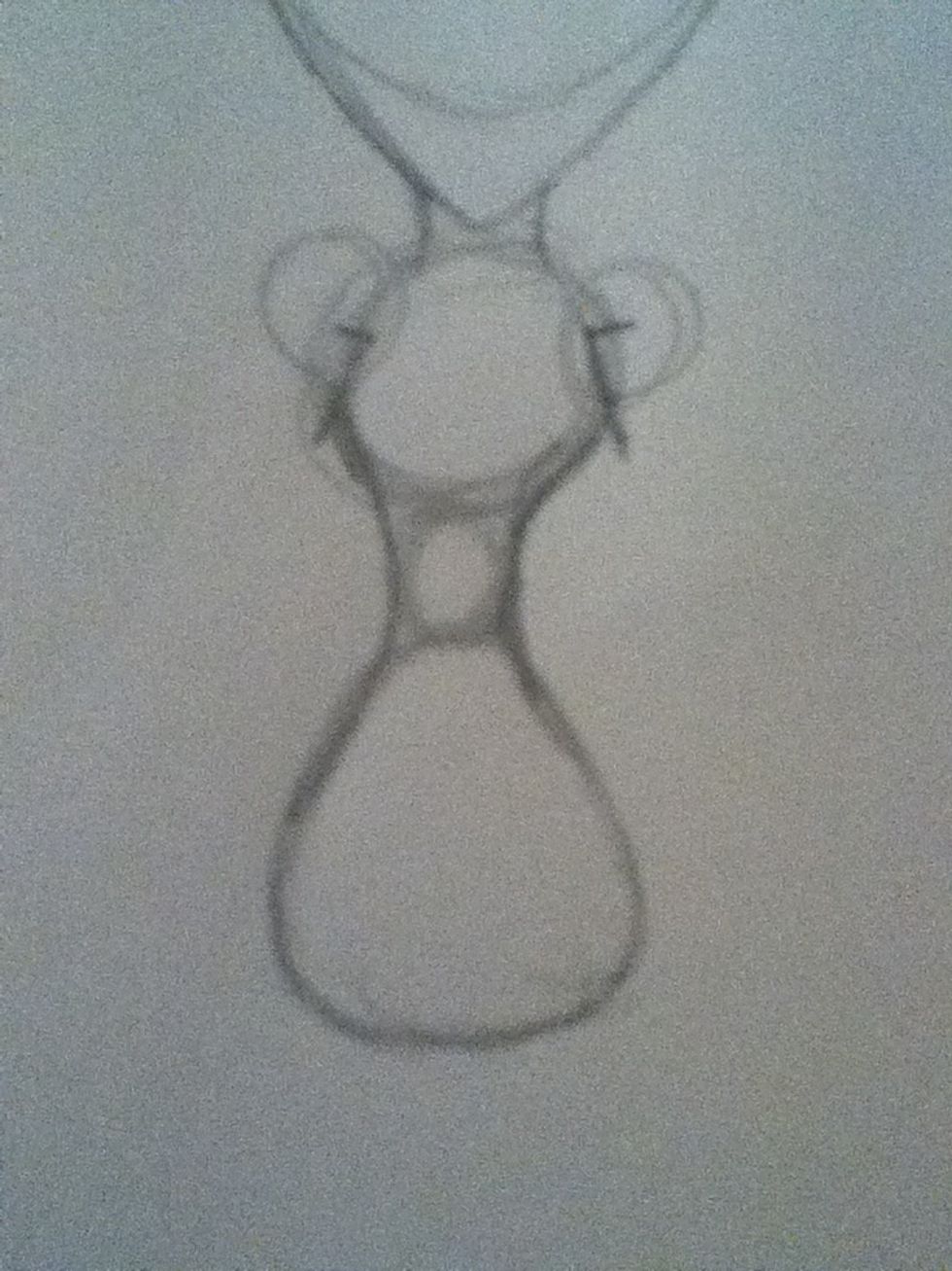 Add some lines, as shown above. These are the starts of the breasts.