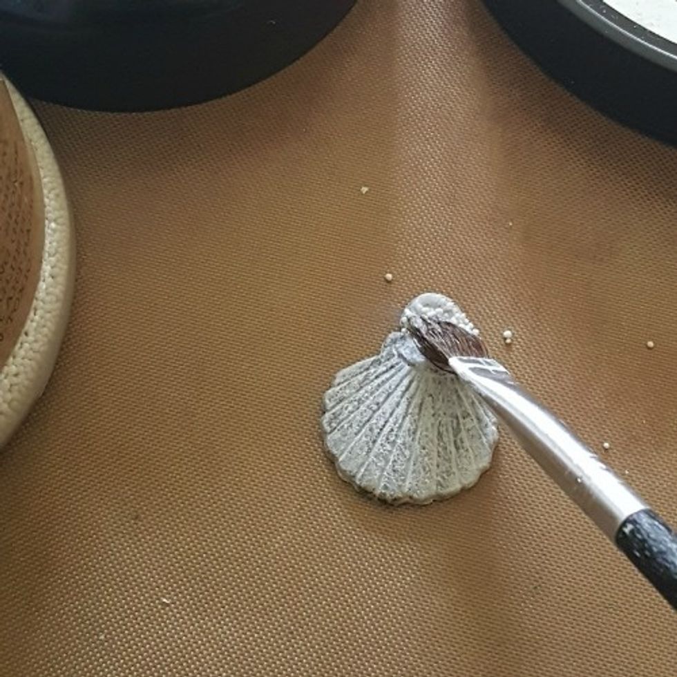 add some mini art stones to some of the embellishments