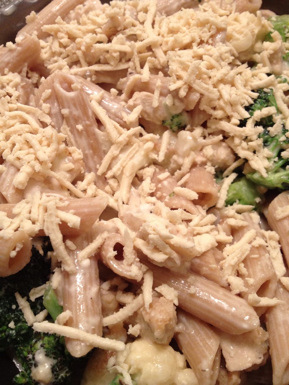 Add some more cheeze on top to make a nice crunchy crust... Place in over at 350-400 for 15-20 minutes. I usually eyeball it until I see the pasta and cheeze browning..