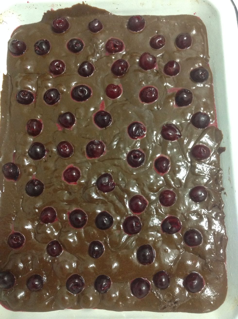 Add some more cherries and put it in the oven