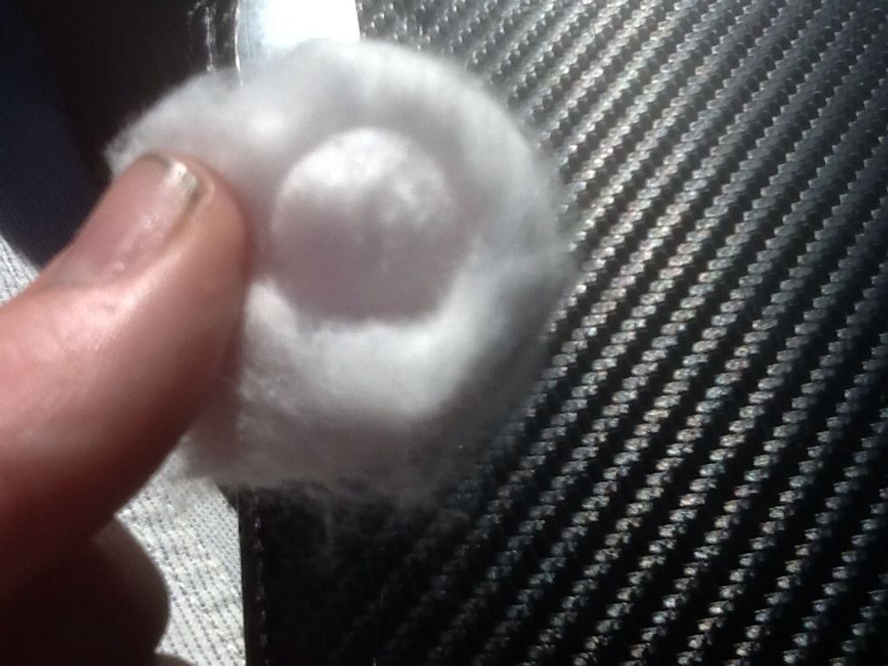 Add some nail polish remover onto a cotton ball