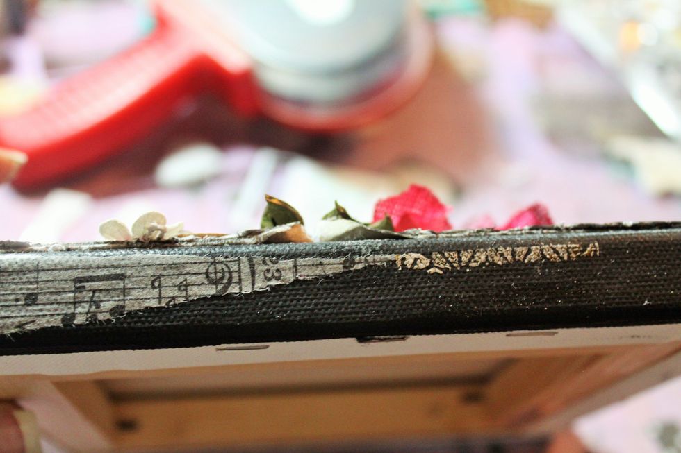 Add some of the border rub on and foil to the side of the canvas too.