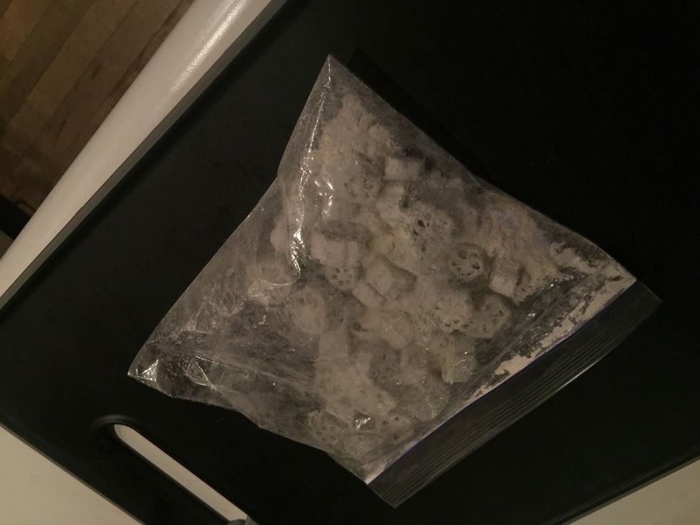 Add some of the white flour to a ziplock and add the Okra.