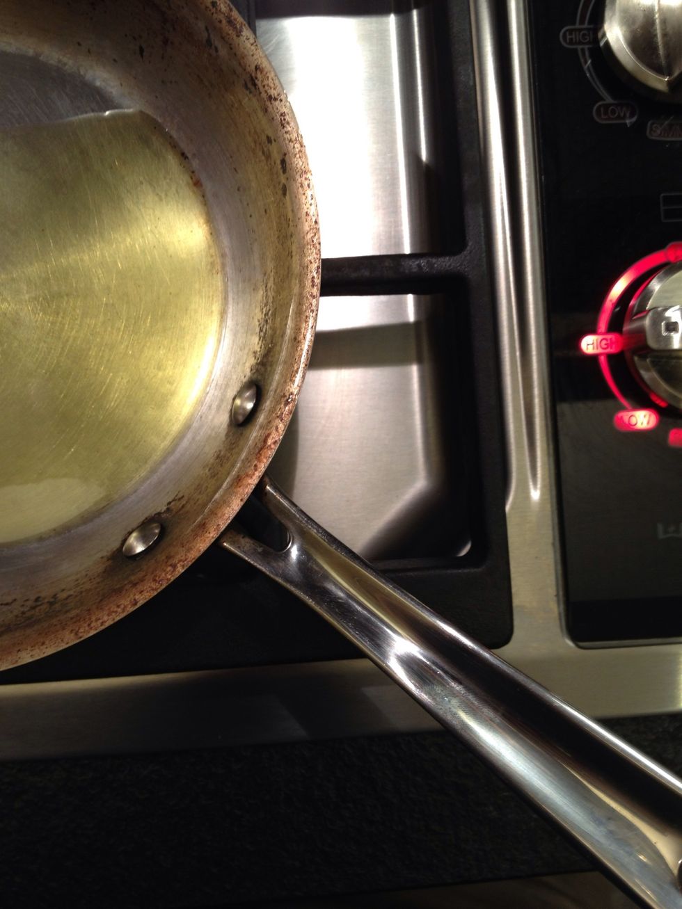 Add some olive oil to the pan. Use a pan/pot that has a lid