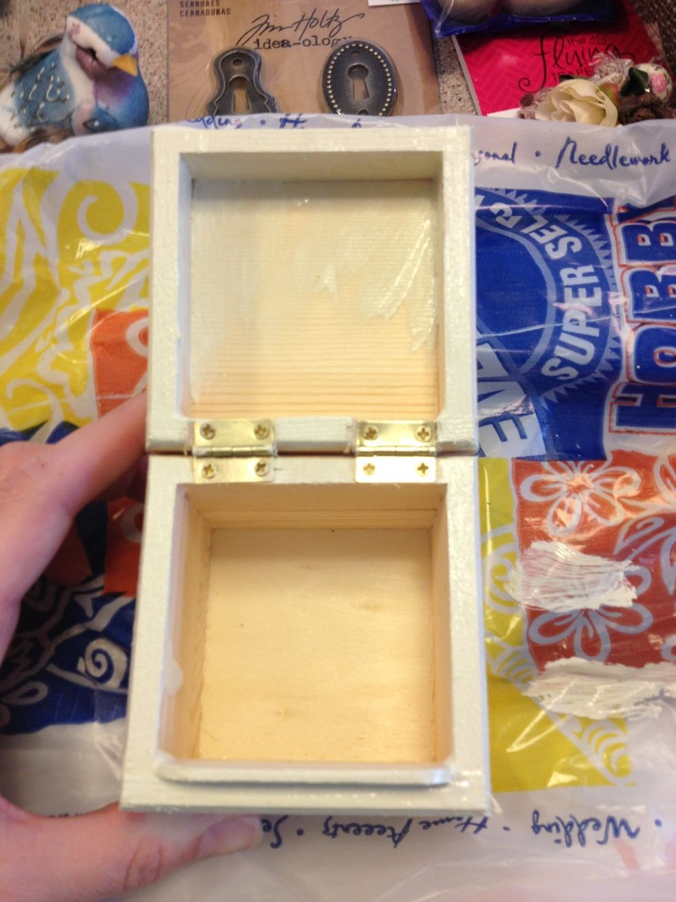 Add some paint on the edges of the inside of the box. Most of it will be covered with paper.