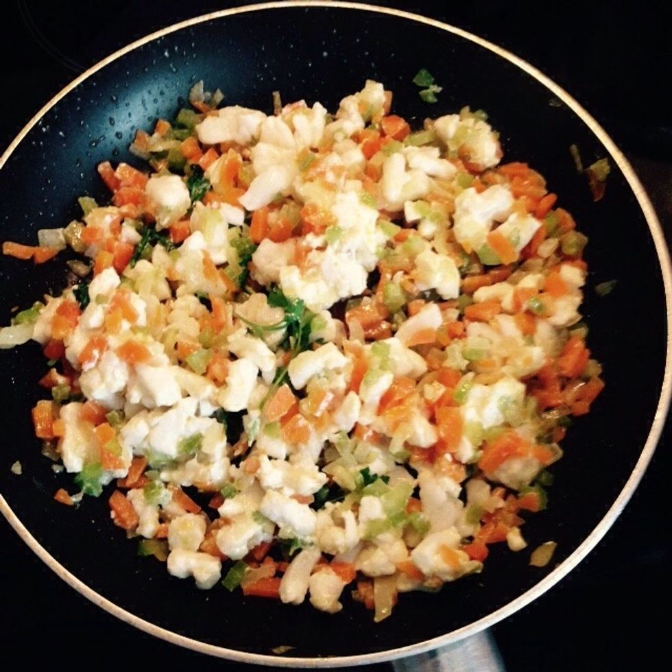 Add some parsley leaves and saut\u00e9 for 5 minutes