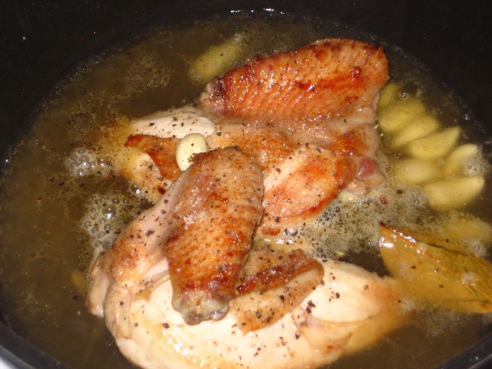 Add some salt and pepper as it starts to simmer.