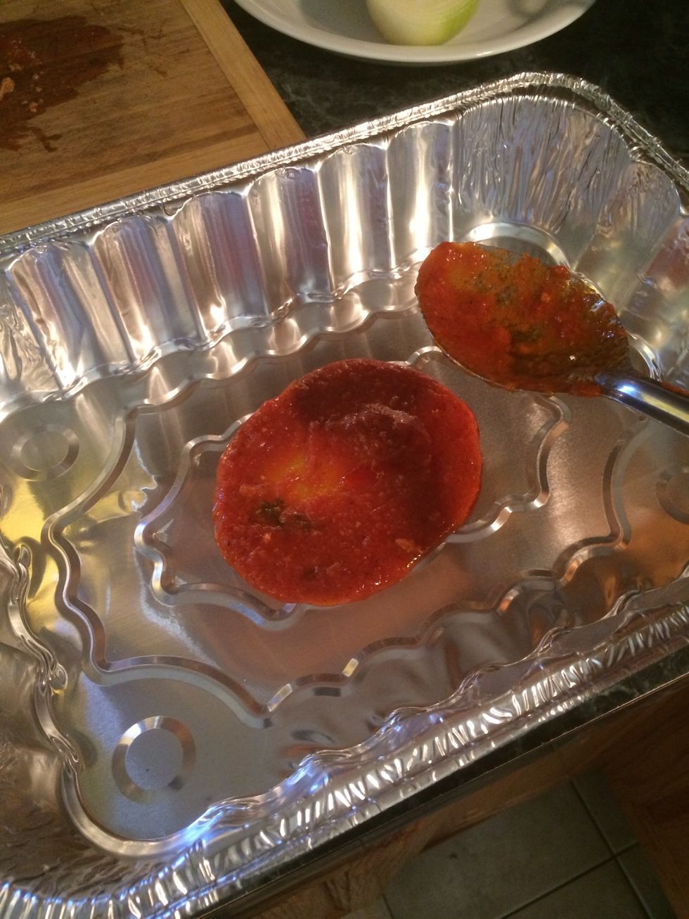 Add some sauce to cover the entire bottom of the pan