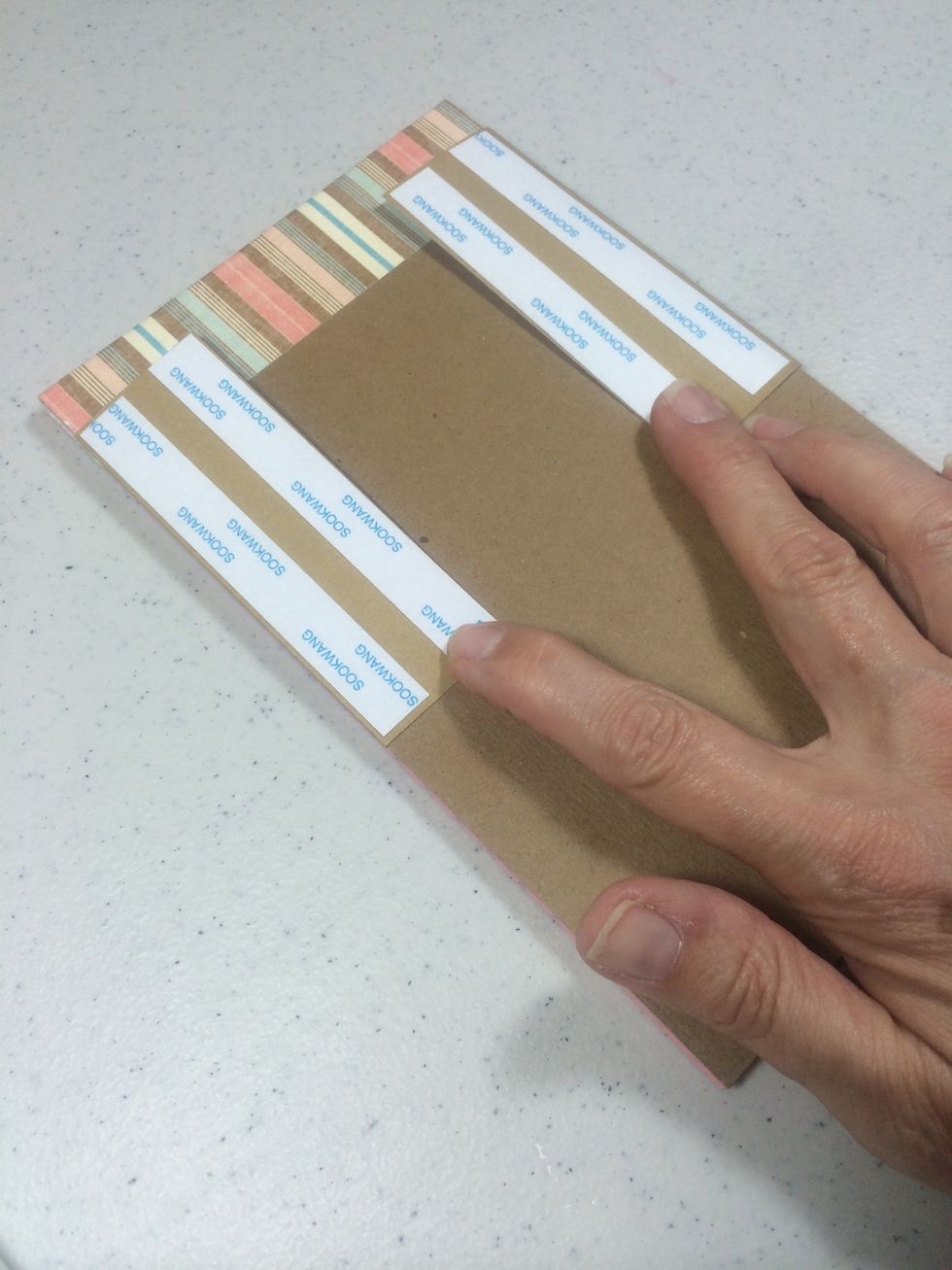 Add some Scor-tape to the side flaps.