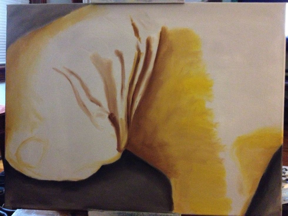 Add some Sienna to your fingers to start Bender's wrinkles and shadows. Pay attention to the direction of fur, and use your fingers accordingly.