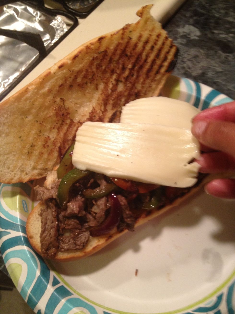 Add some slices of cheese. I used mozzarella, you can use any cheese you like. Put it in the microwave for a minute or two until cheese melts. Or make all your sandwiches and put them in your oven.\ud83d\ude4c