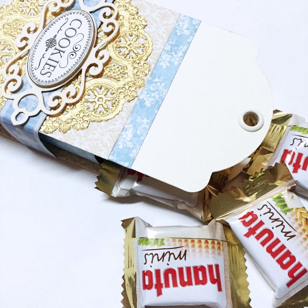 Add some sweet treats into the box.