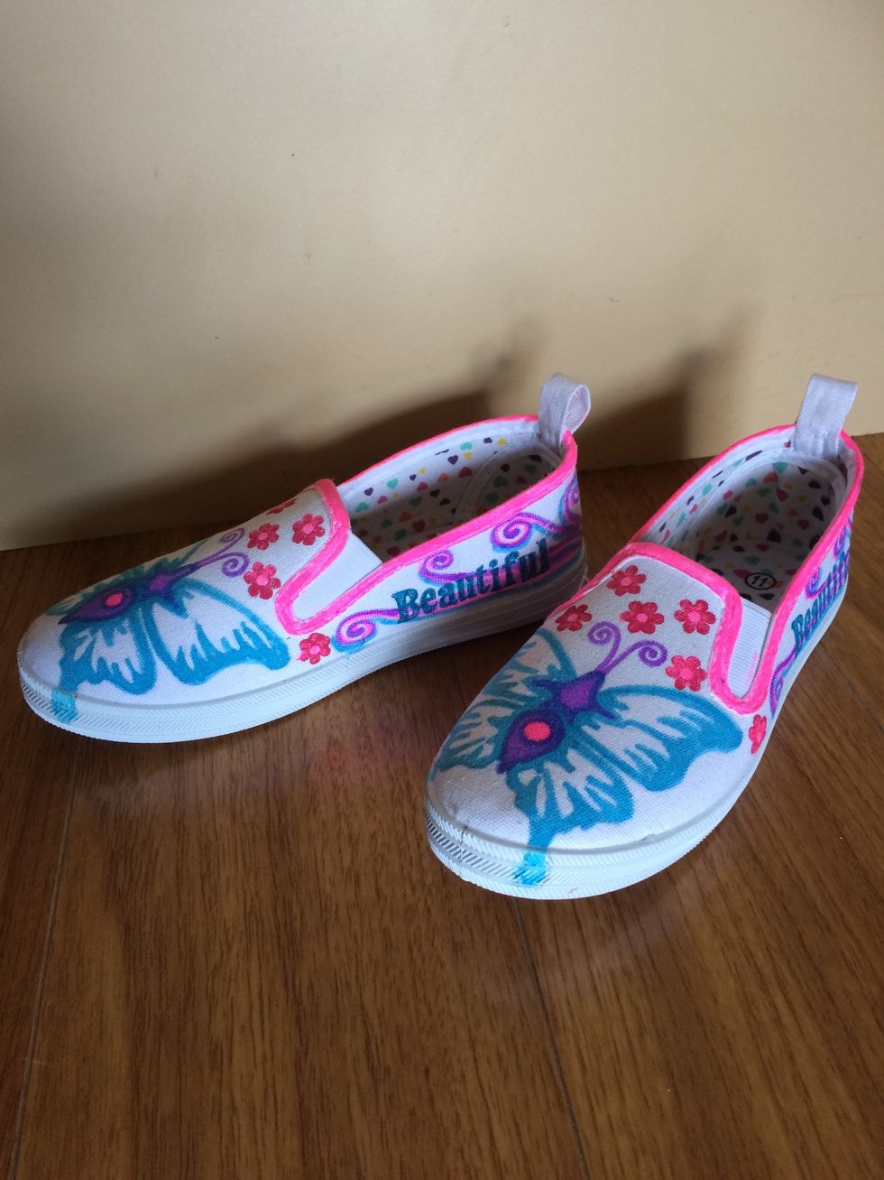 Add some swirls around lettering and some more Pink.