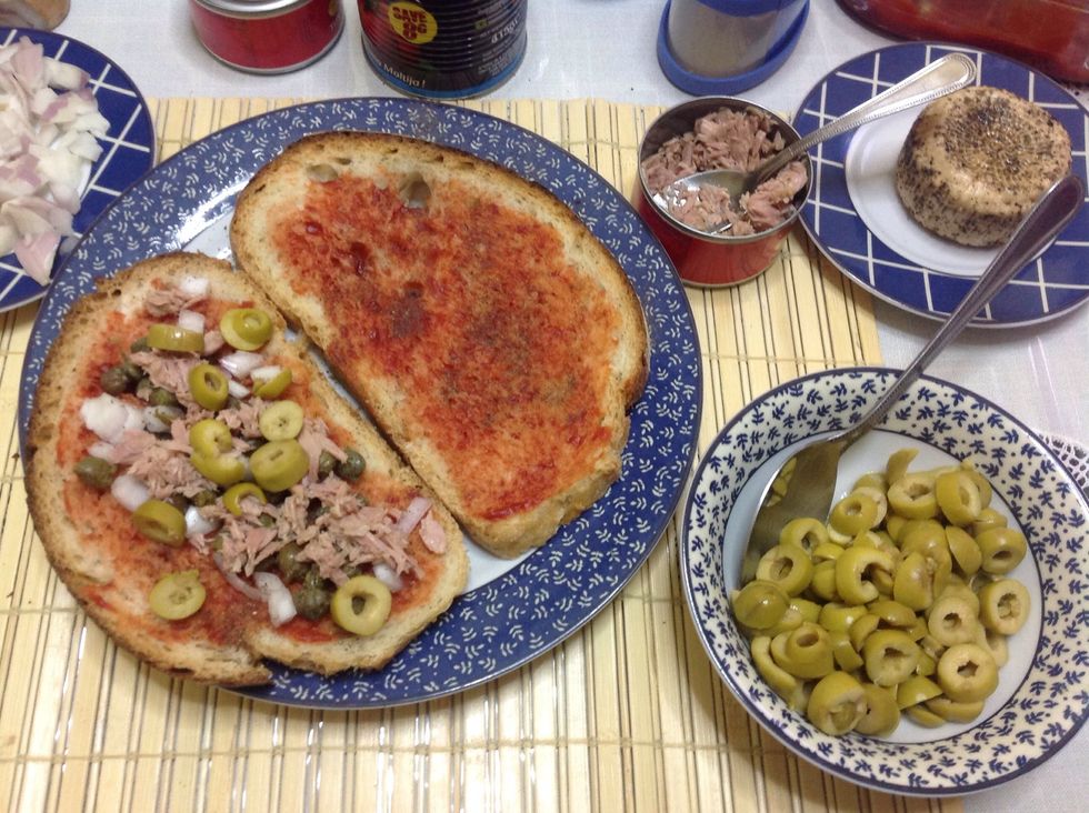 Add some tuna and olives.