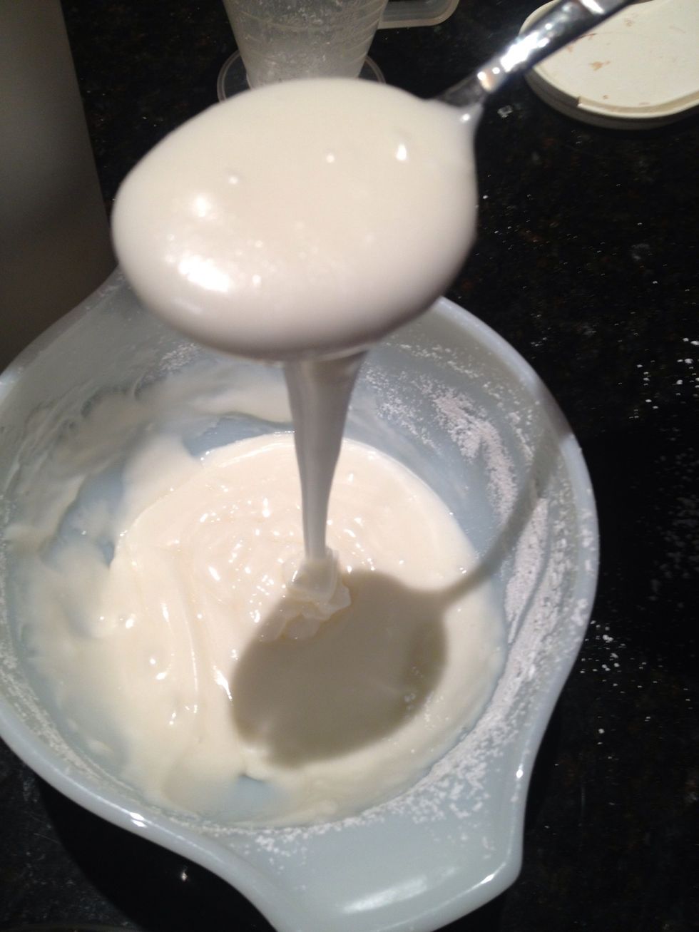 Add some water and mix with a spoon until smooth mixture is achieved