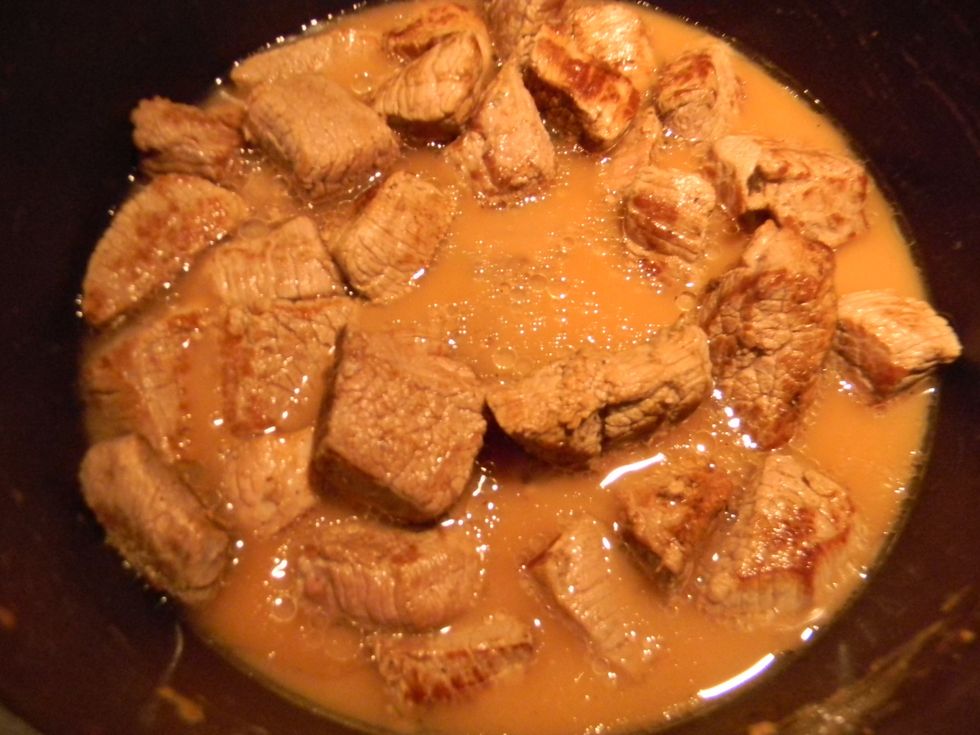 Add some water or beef broth until the meat is almost covered. Add the wine vinegar and if you fancy you may as well add some wine.