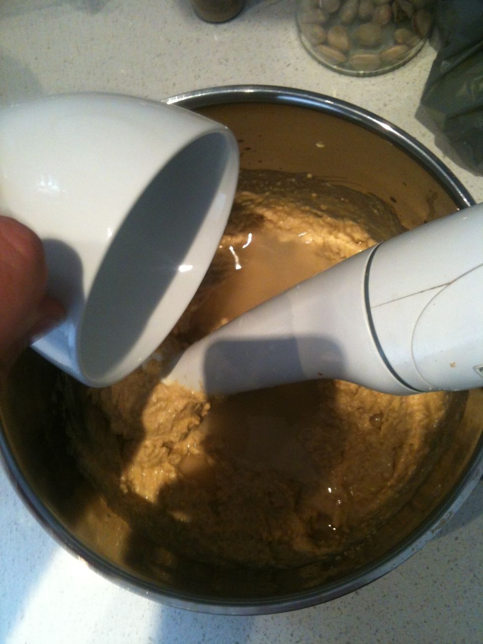 Add some water to reach desired texture. No more then a 1/4 cup.... I use less as I like my hummus a bit more thick and rustic.