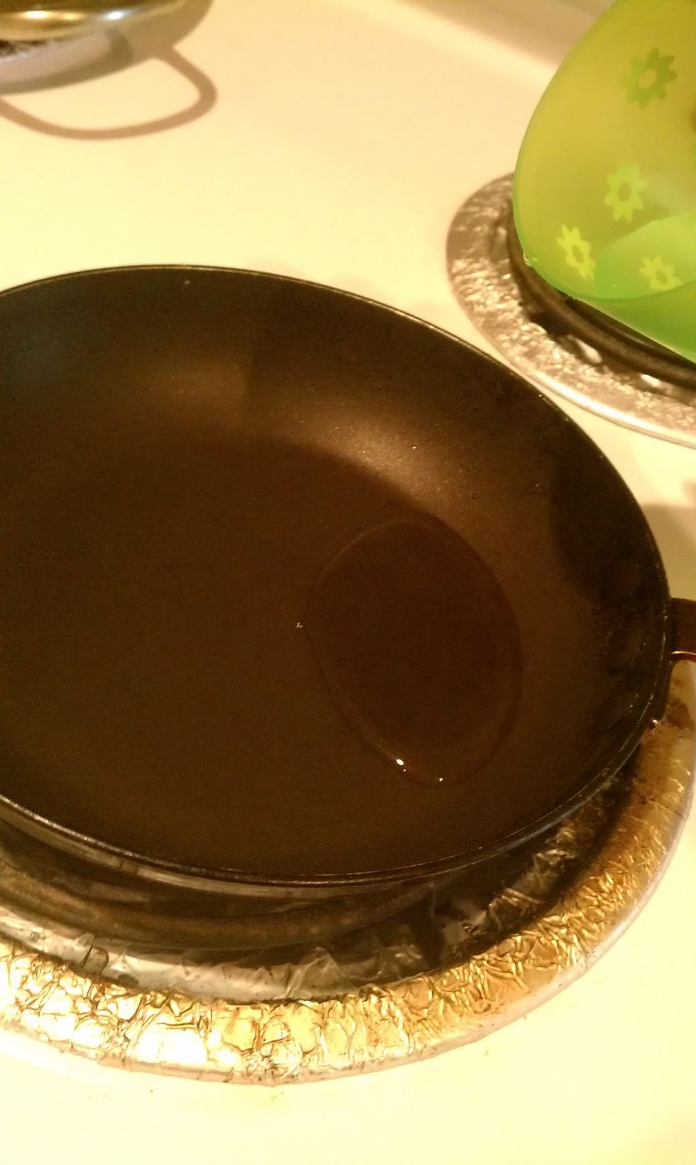 add some water to the pan and wait for it to start sizzling