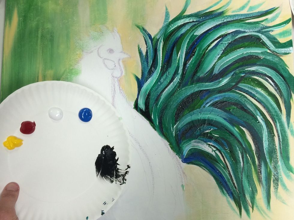 Add some white paint over it all and allow it to blend a little with all the other colors. I also added a little black to create shadows with the small brush.