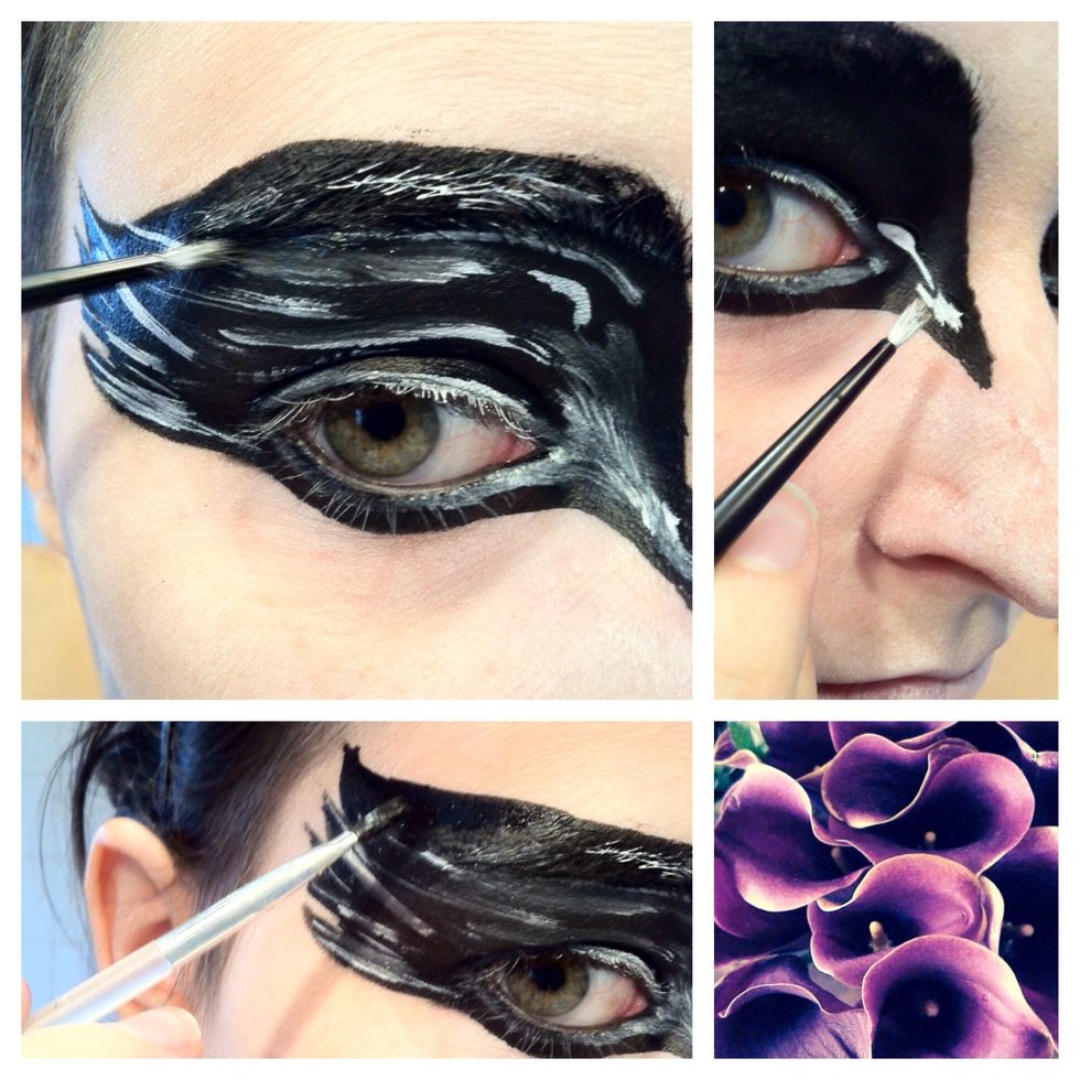 Add some white stripes to the black shape. You can blend it a little with a clean and watery brush. I also changed the shape a little bit more.