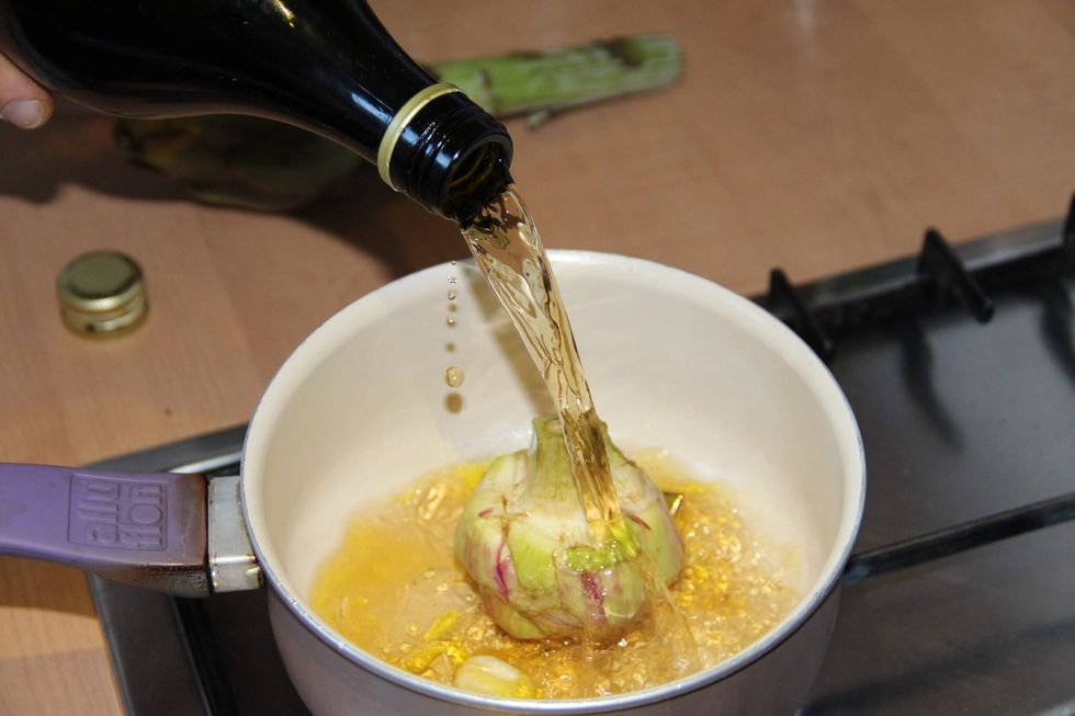 Add some white wine and cook on low flame till you stick a knife in it and it goes in smoothly