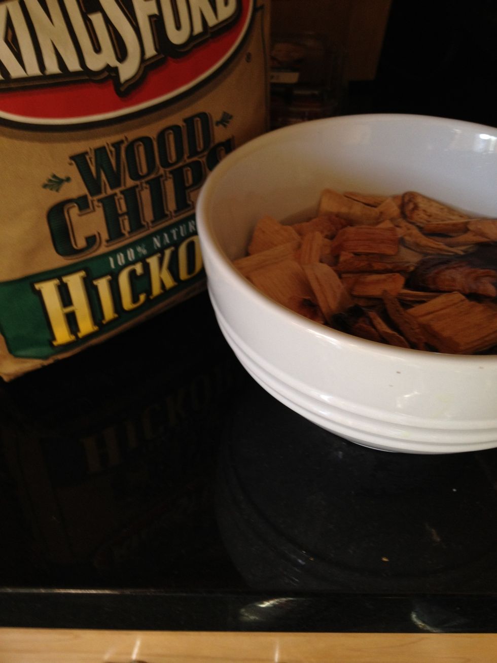 Add some wood chips to a bowl of water to soak whiles the grill heats up. I like hickory, apple or cherry wood.