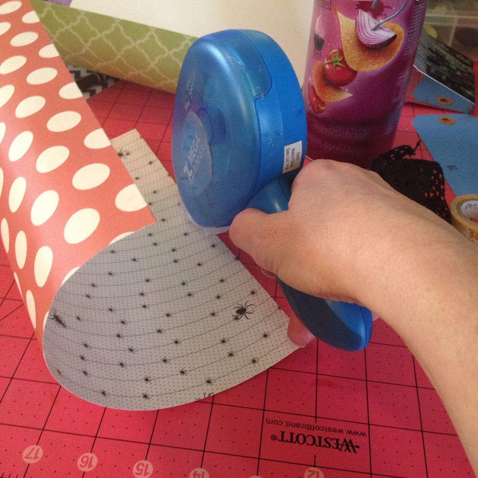 Add some Xyron tape runner to both long edges.