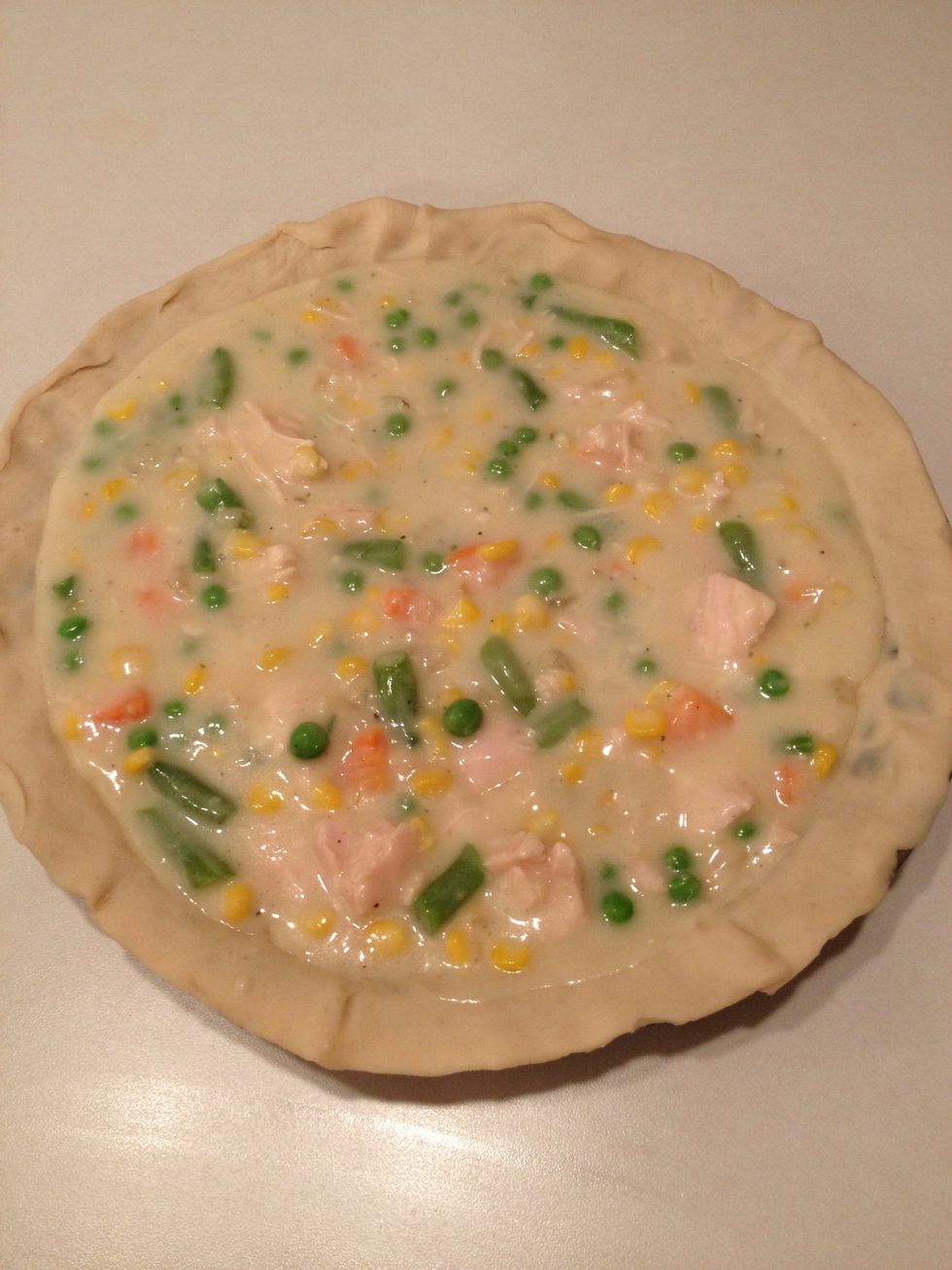 Add soup mixture to pie crust.