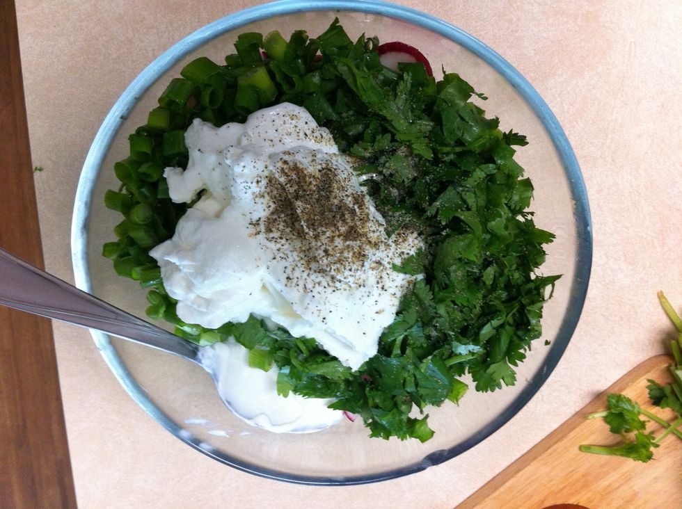 Add sour cream, black pepper and salt