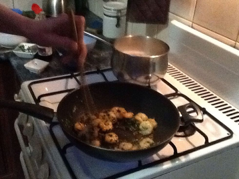 Add soy, mirin and sesame until fragrant.