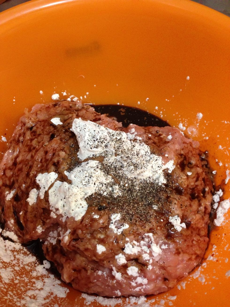 Add soy sauce, corn starch, sugar, and pinch of black pepper. Mix it well.