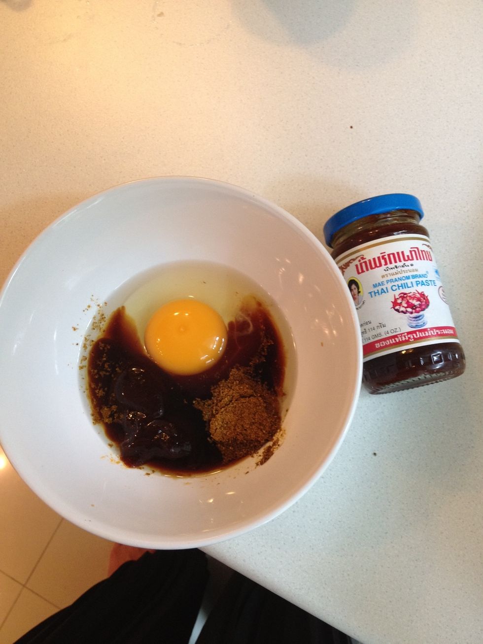 Add soy sauce, oyster sauce, chili paste, curry powder in to the egg. (if use, add evaporated milk) i would suggest that you do, it adds tons of flavor. I don't coz i'm allergic to milk.