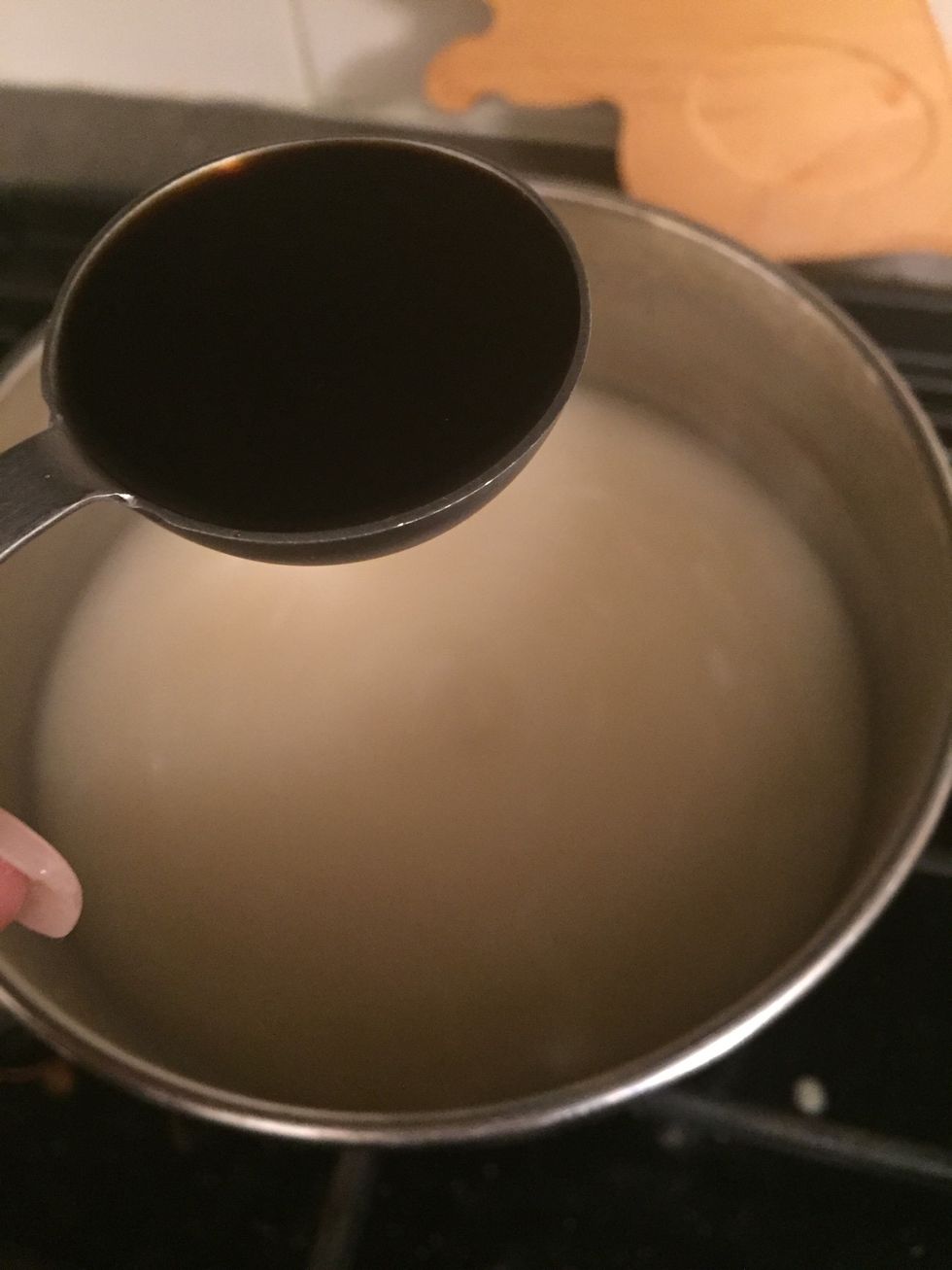 Add soy sauce to broth.