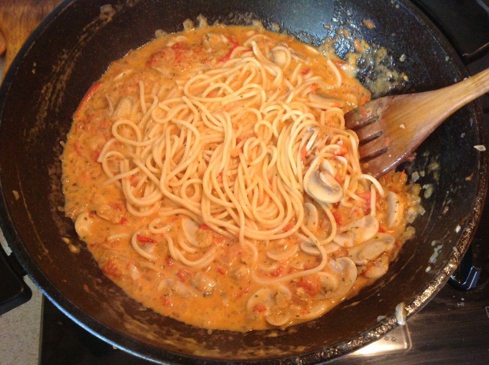 Add spaghetti, and stir Heat the spaghetti a bit this way
