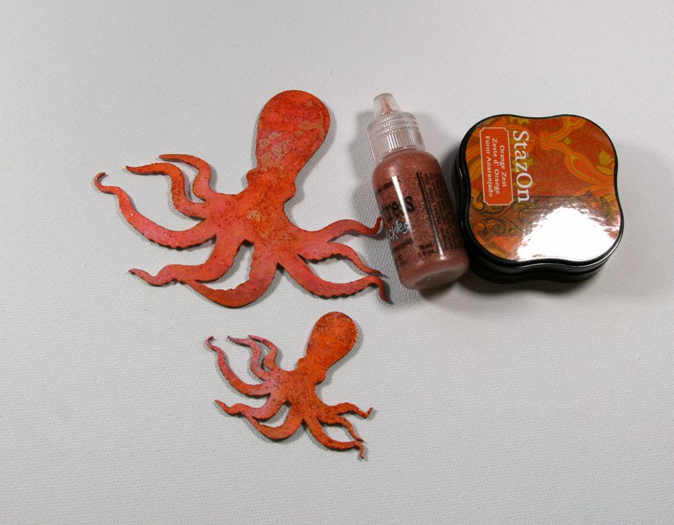 Add sparse layer of Dried Marigold Distress Stickles to prepared octopuses and allow to dry. Next add a layer of StazOn in Orange Zest.