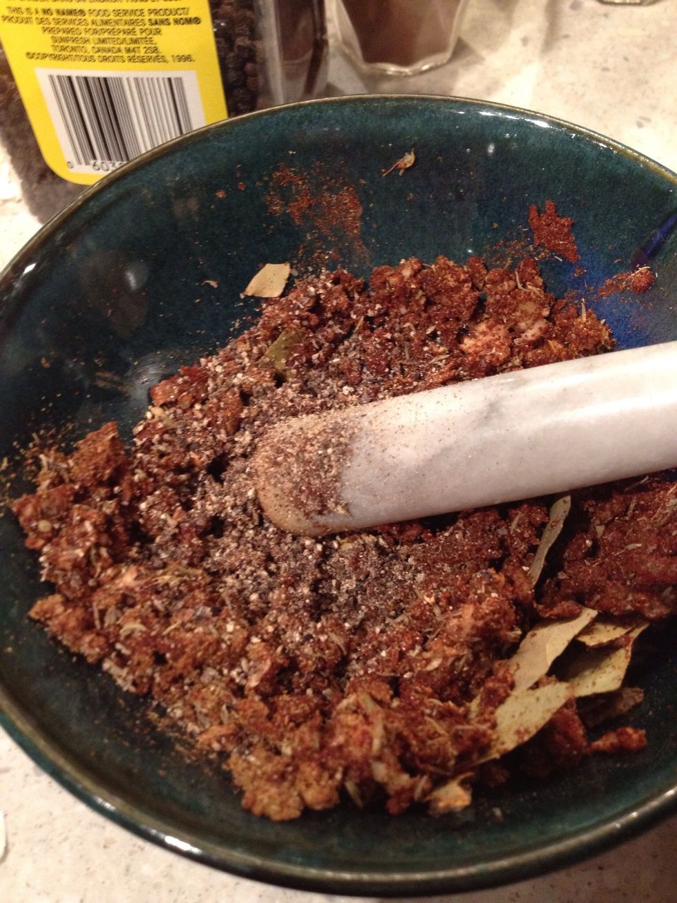 Add spices, then mush it all together. I added bay leaves - le your nose guide you.