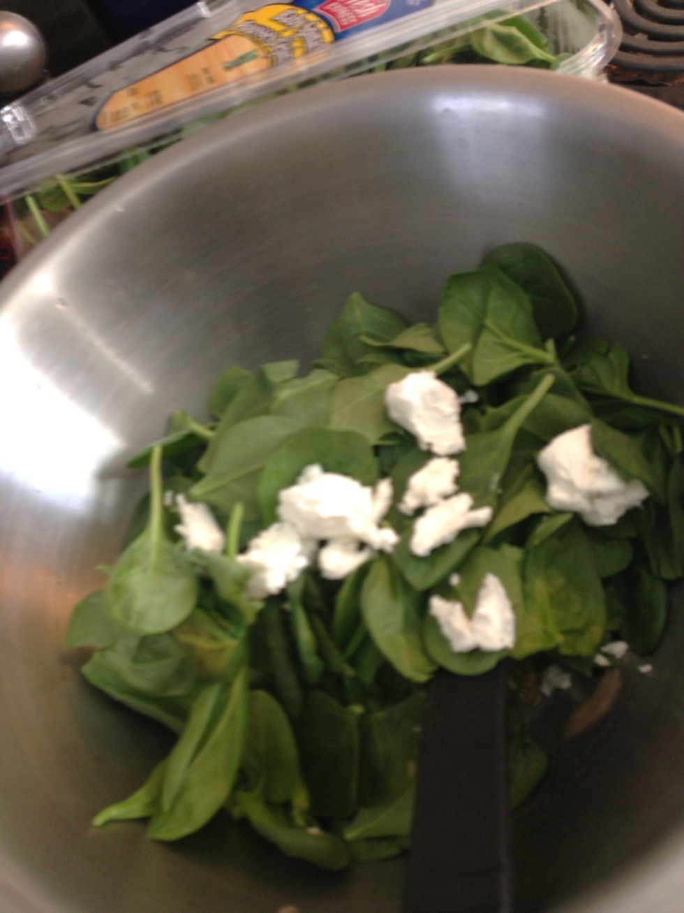 Add spinach and cheese to items in bowl.