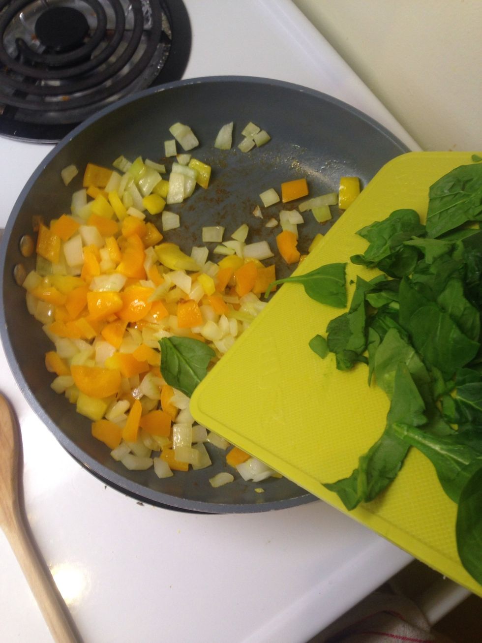 Add spinach and cook.