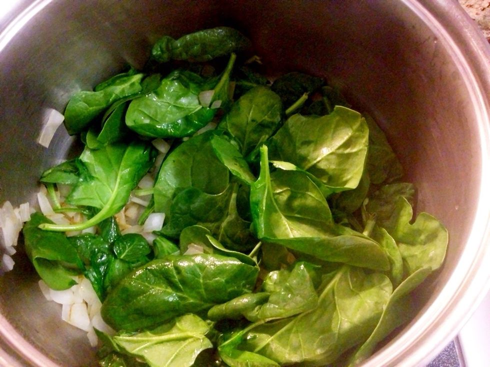 Add spinach and stir til rich green color